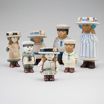 A set of seven "Sekelskifte" stoneware figurines by Lisa Larson for Gustavsberg.