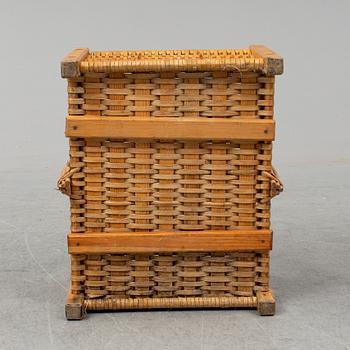 A rattan bottle basket.
