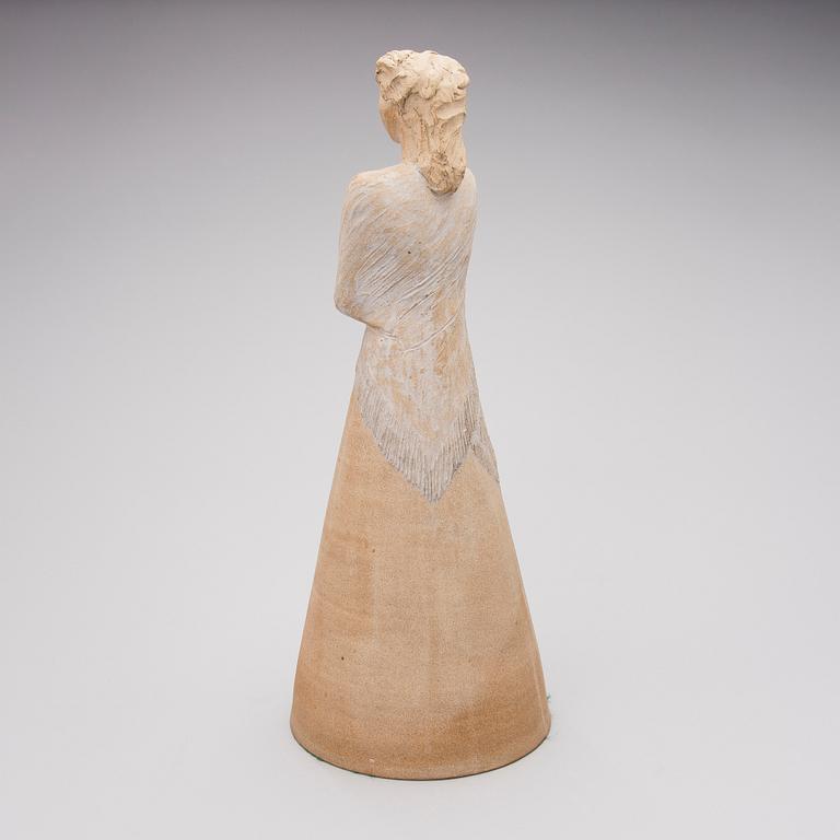 A signed stoneware sculpture.