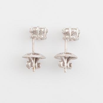 Brilliant cut diamond earrings.
