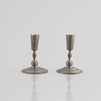 A pair of pewter candlesticks and a dish, Firma Svenskt Tenn, Stockholm 1926-1927.