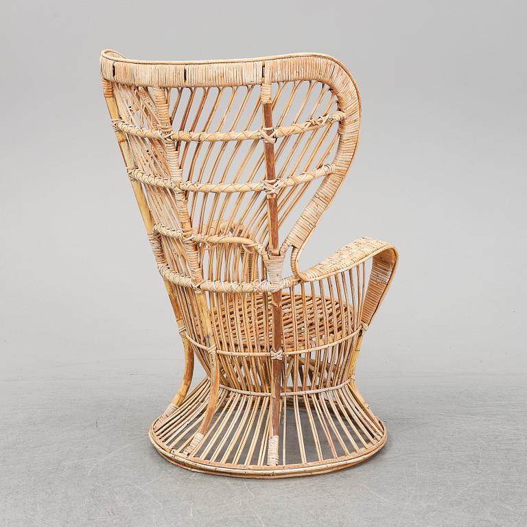GIO PONTI & LIO CARMINATI, A 'Conte Biancamano' rattan Wingback Armchair for Bonacina, Italy.