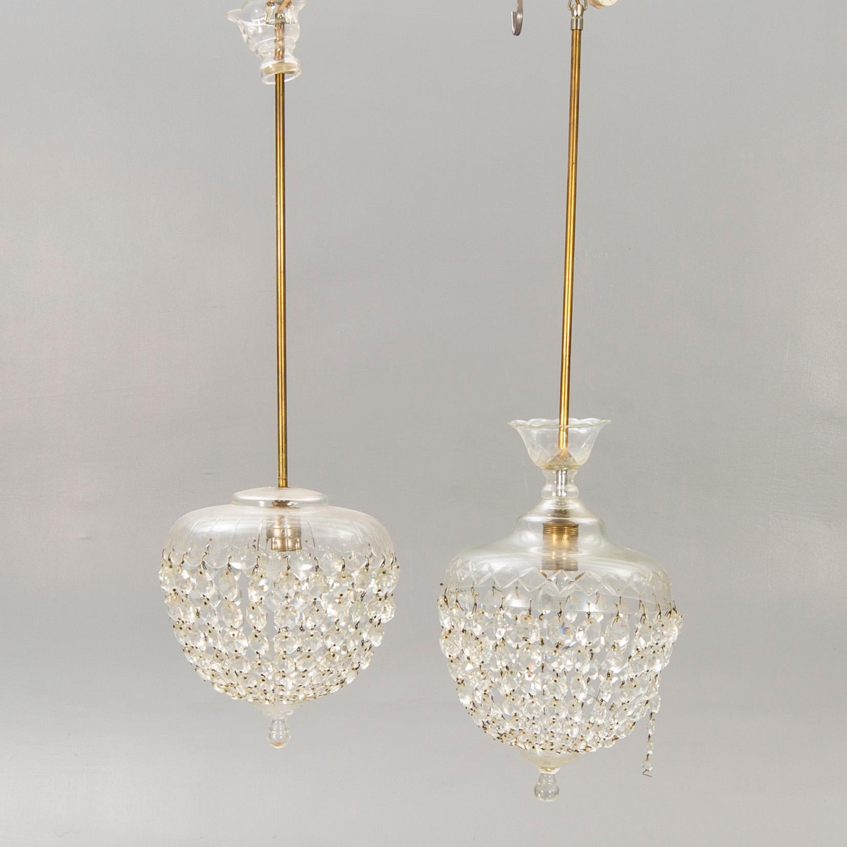 A pair of ceiling pendants around 1900.