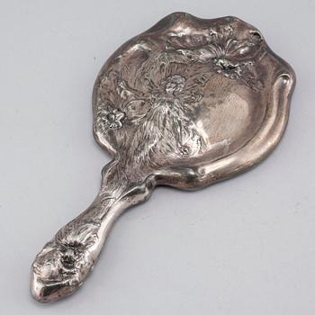 A silverplate toiletrie set, 2 + 4 pcs, early 20th century.