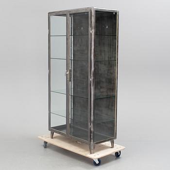 A glazed cabinet, second half of the 20th Century.