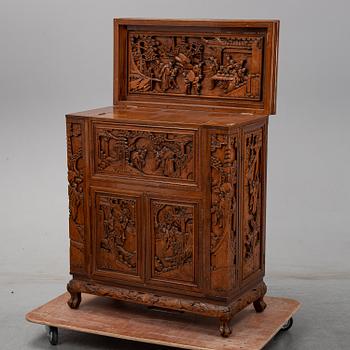 A 20th century chinese bar cabinet.