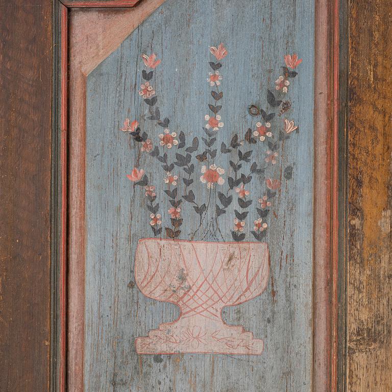 A folk-art cabinet attributed to  "Gammelmålaren" Anders Nilsson (Brunskog, 1807–1889).