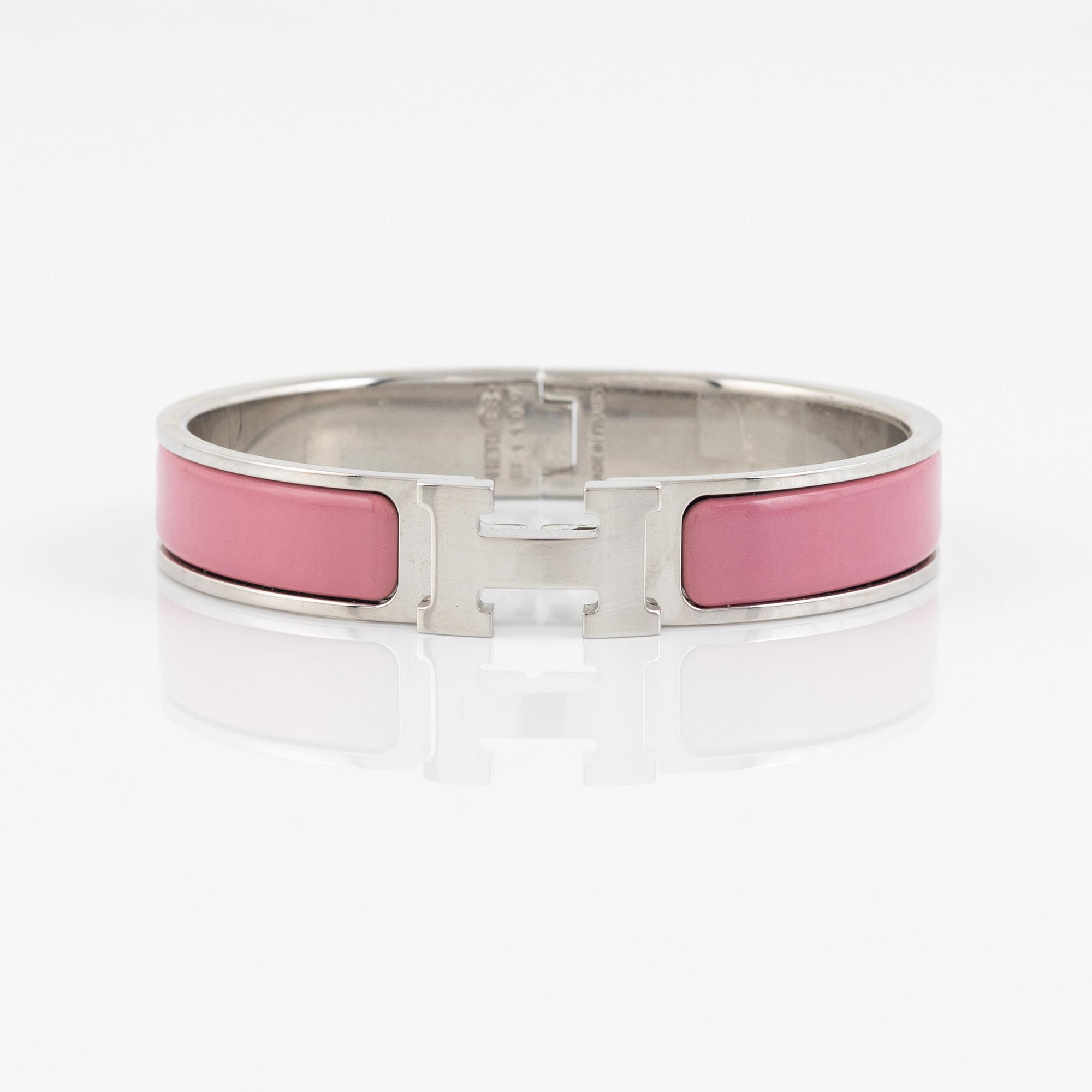 Hermès, a 'Clic H' bracelet.