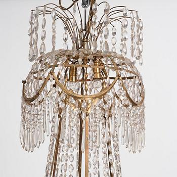 A late Gustavian gilt brass and cut glass seven-light chandelier, Stockholm, late 18th century.