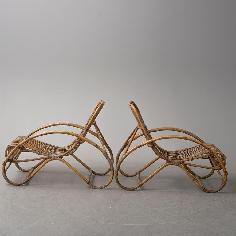 a pair of rattan easy chairs, 20th century.