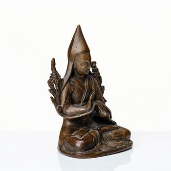 A Nepalese copper alloy figure of Tsongkapa, 20th Century.