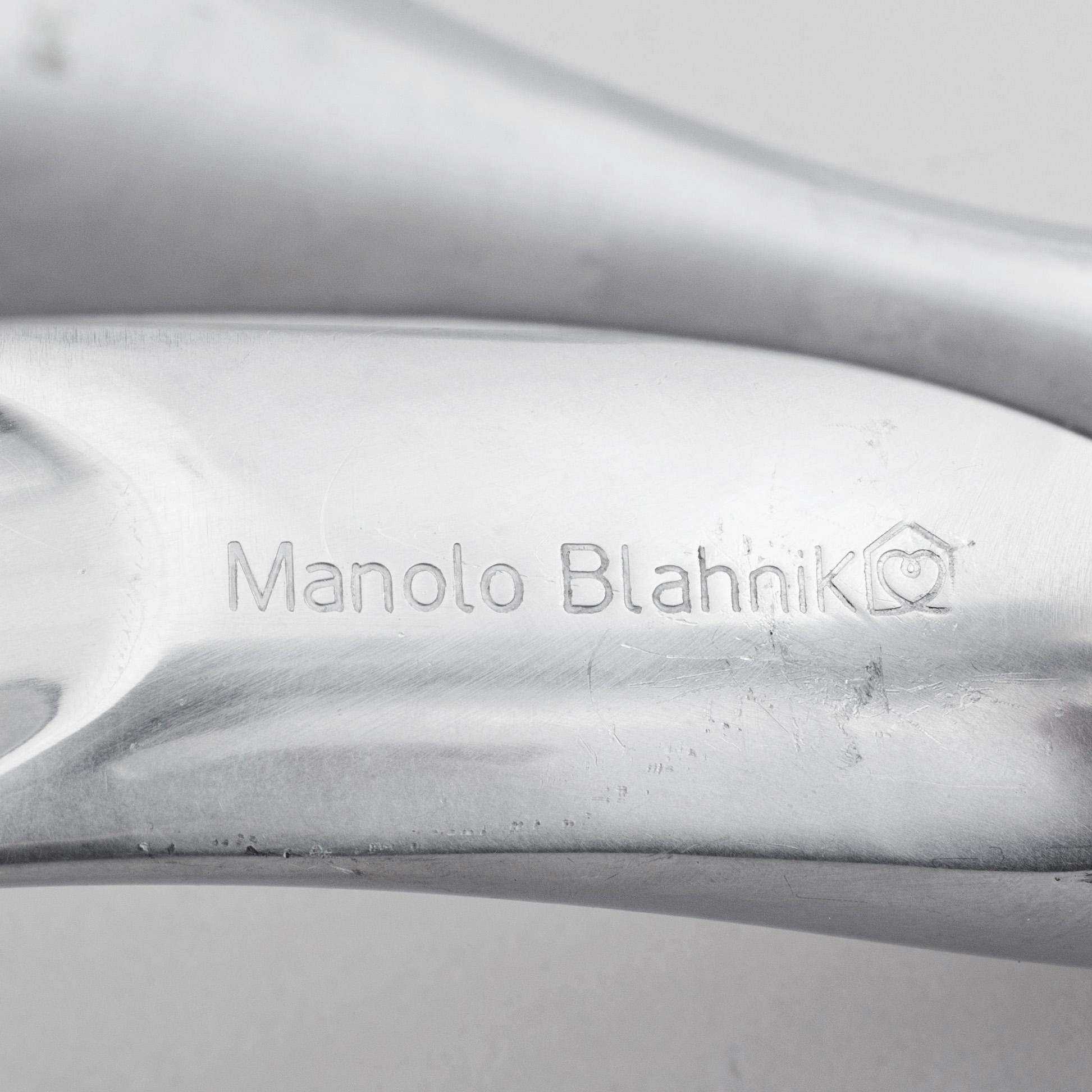A metal shoe horn by Manolo Blahnik, 2000s.