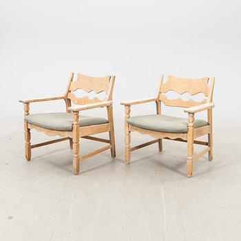 Henry (Henning) Kjaernulf, pair of arm chairs Nyrup furniture factory, Denmark, mid 20th century.