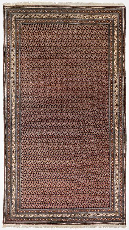 A carpet, antique/semi-antique, Western Persia, ca 575 x 315 cm.