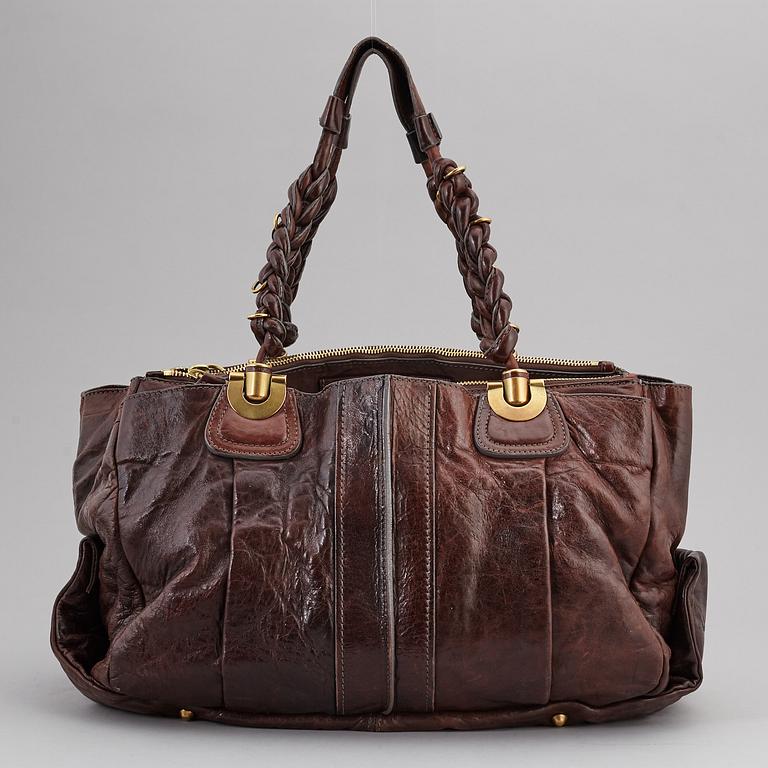 CHLOÉ, a brown leather bag.