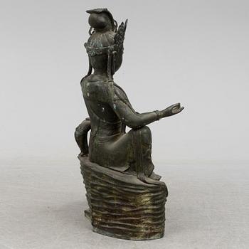A mid 20th century metal Guan Yin figurine, China.
