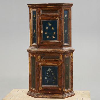 A 18th century corner cabinet.