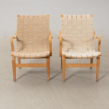 Bruno Mathsson, a pair of "Eva" armchairs, Bruno Mathsson Company, Värnamo, late 20th century.