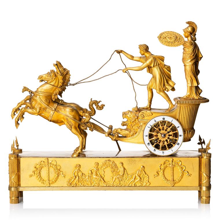 A French Empire early 19th century gilt bronze mantel clock, marked J Langlois à Paris.