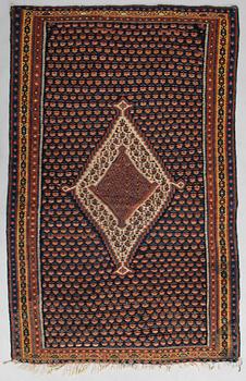 A Senneh kelim carpet, ca. 186 x 120 cm.