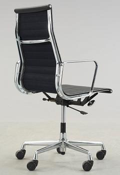 A Charles & Ray Eames 'Aluminium group' office chair, Vitra, model EA 119.