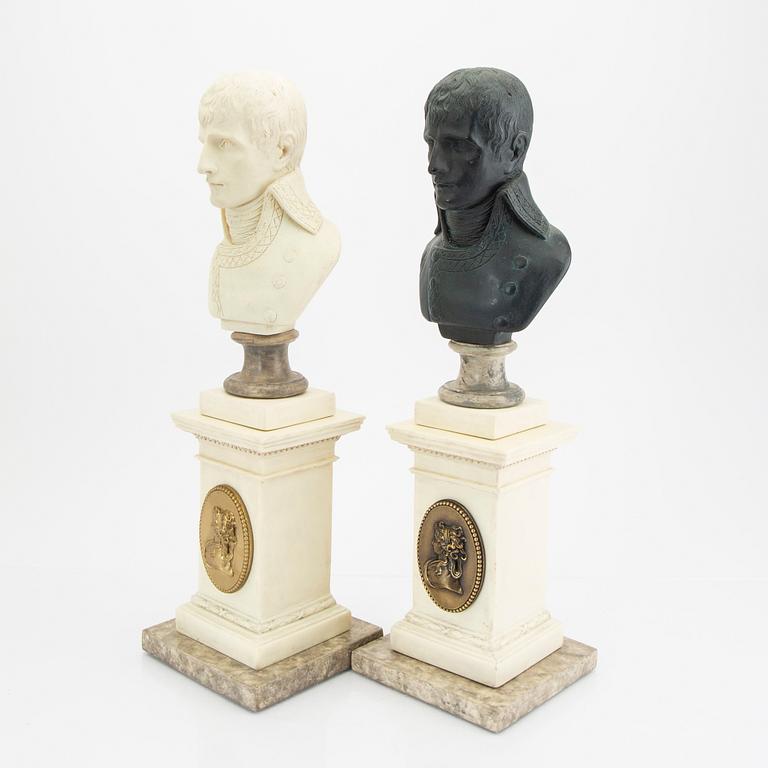 A pair of modern plaster statues of Napoleon.