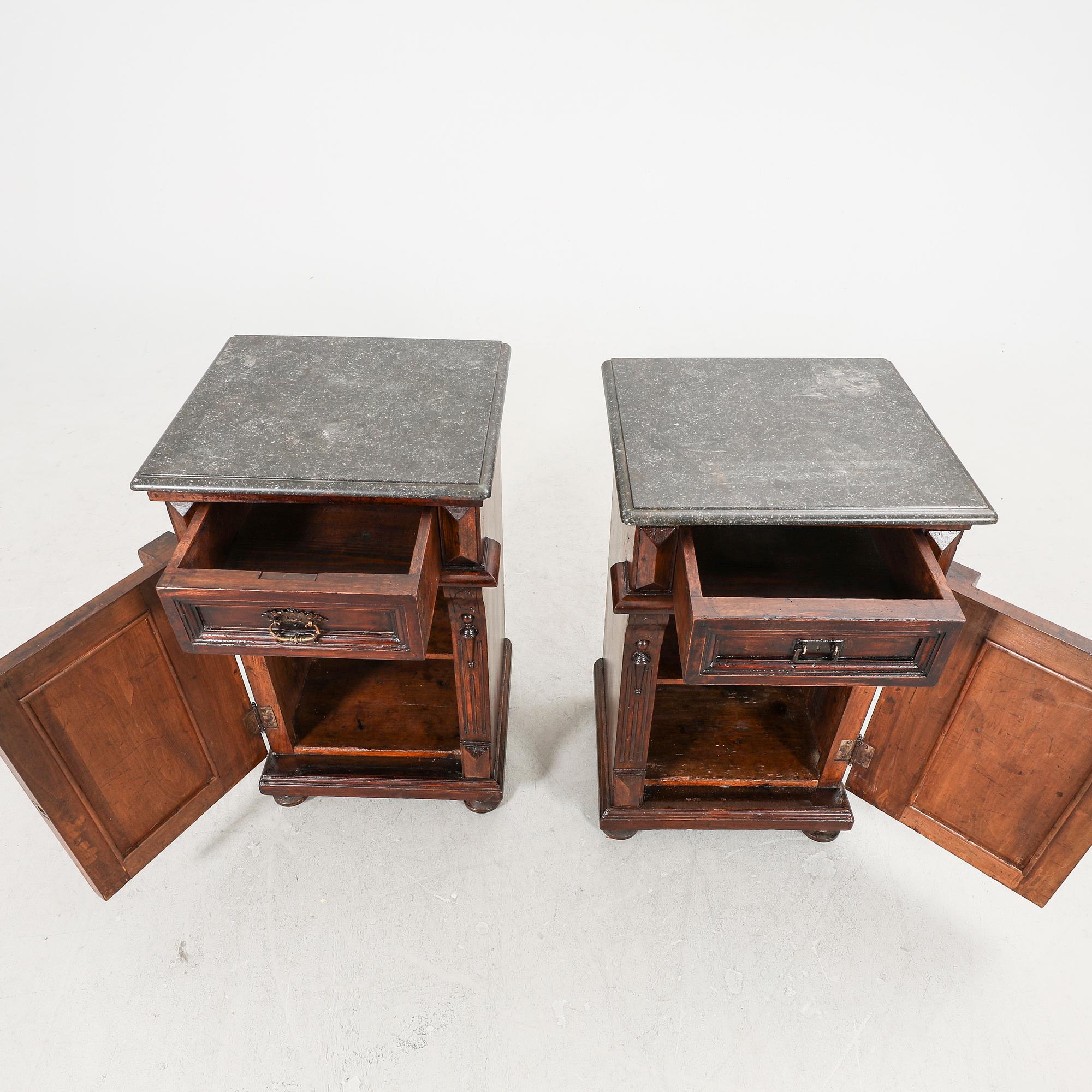 A pair of walnut bedside tables first half of the 20th century.