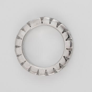 An eternity ring, set with brilliant-cut diamonds. Total carat weight 3.24 cts. 18 x ca 0.18 ct.