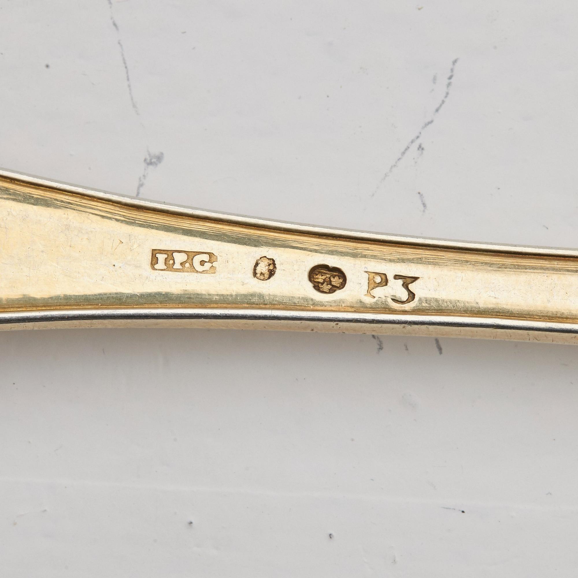A Swedish 19th / 20th century 36 piece silver-gilt dessert-cutlery, mark of JP Gonvall, Stockholm 1818-1821 and.