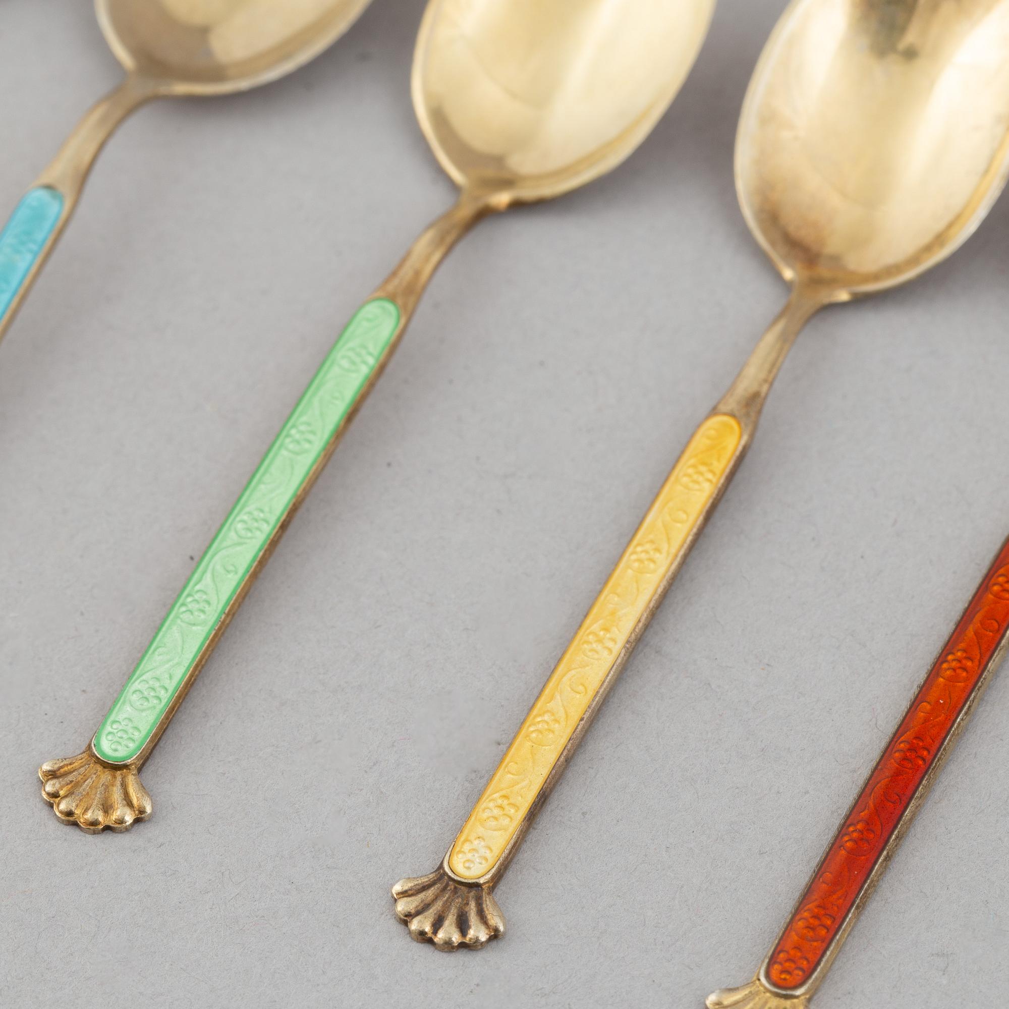 24 silver gilt and enamel coffee spoons, Norway, mid-20th century.