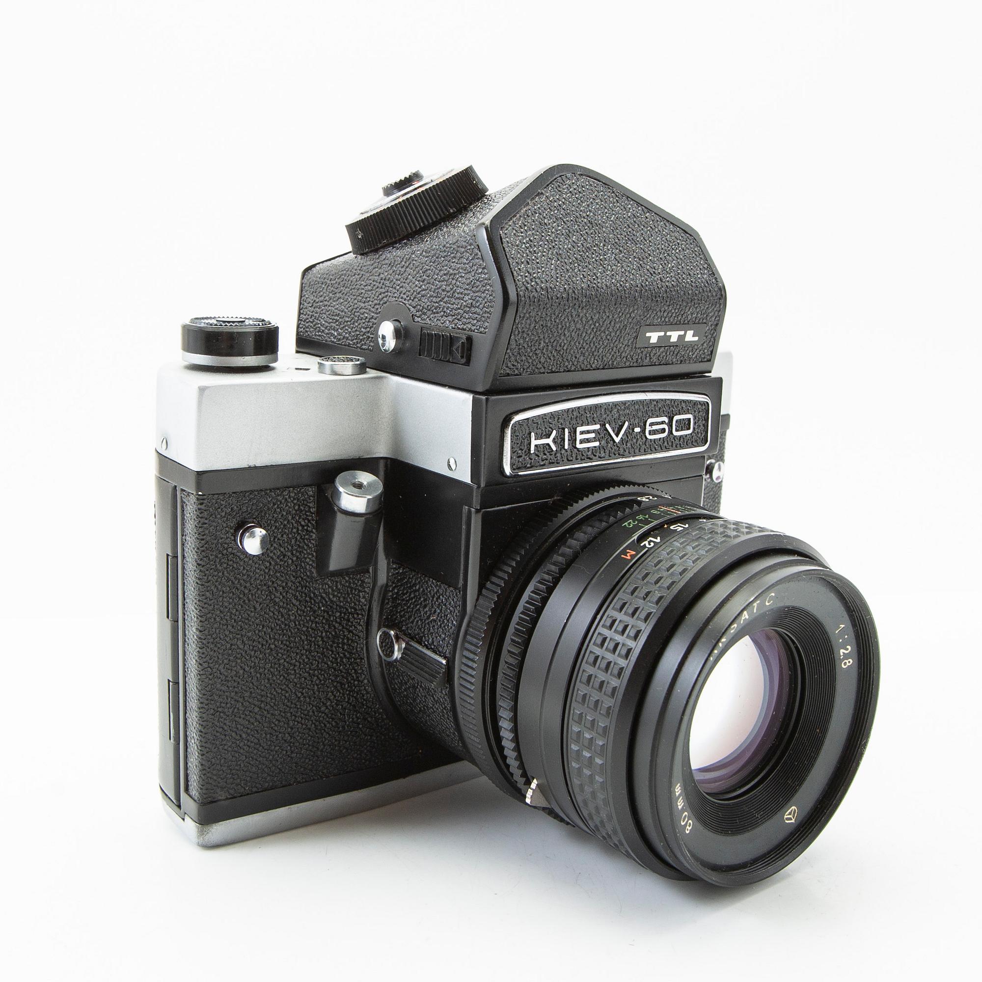 Camera, Kiev 60, and 3 lenses.