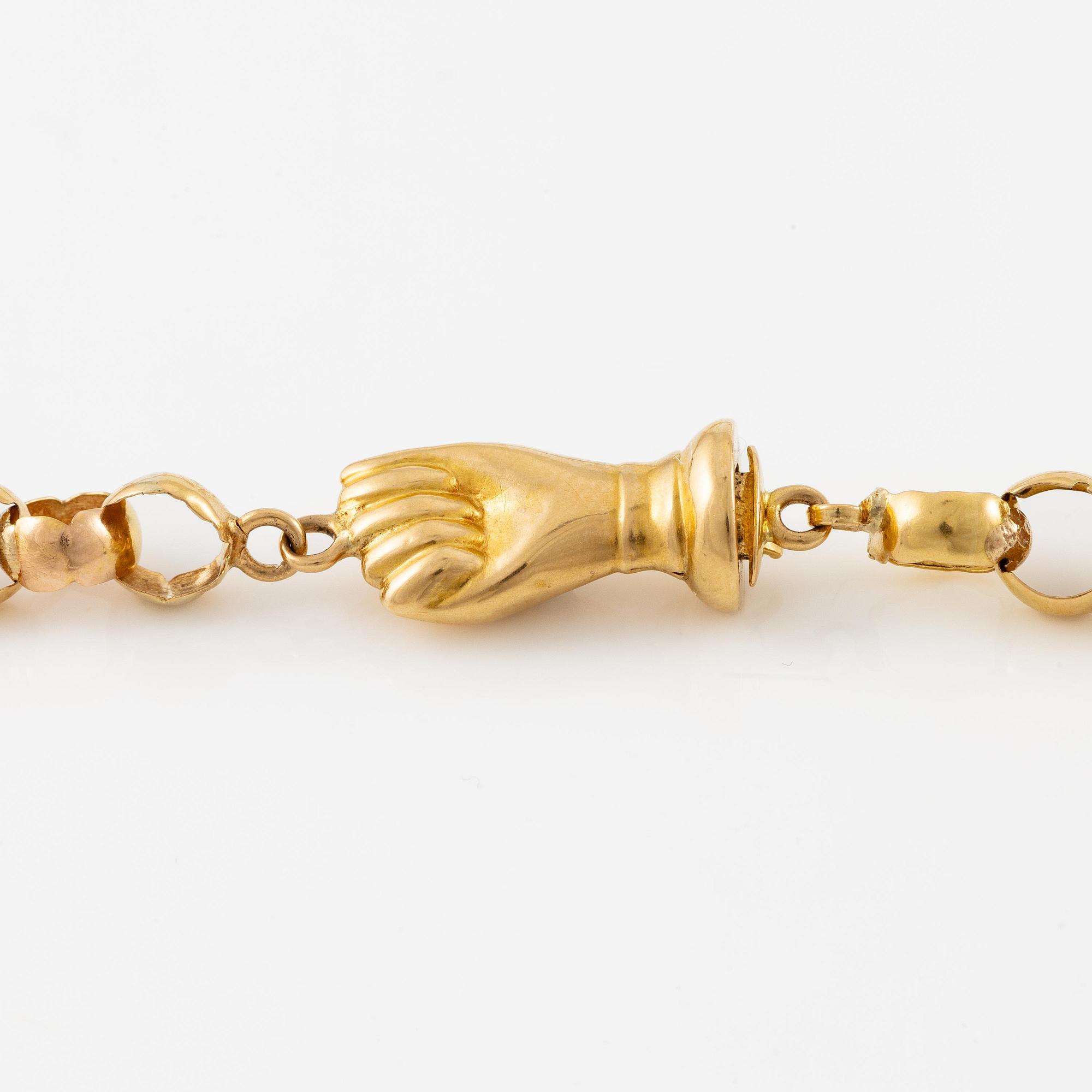 An 18K gold chain.