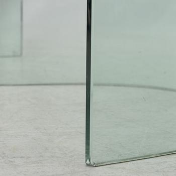 A dining table, glass, contemporary.