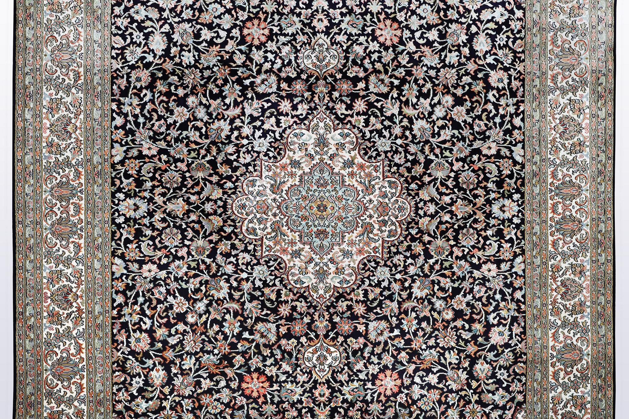 A carpet, silk Kashmir, ca 279 x 195 cm.