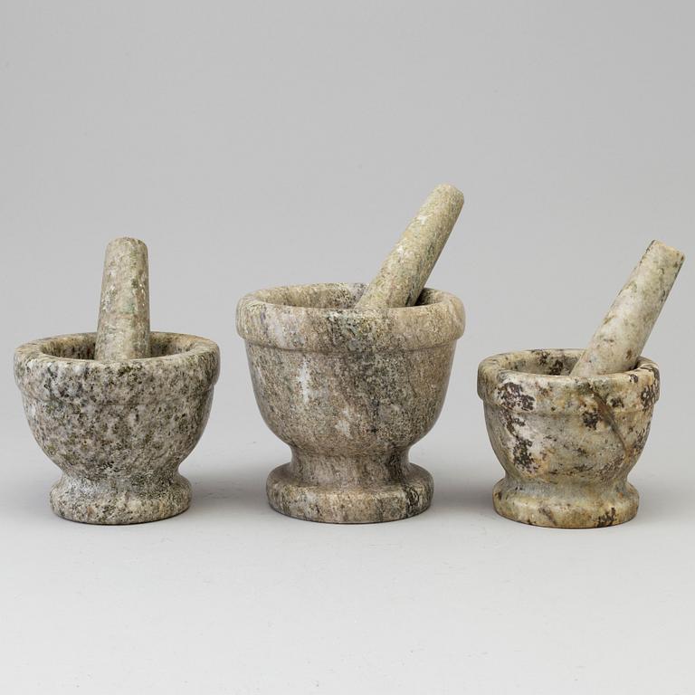 THREE SWEDISH GREEN MARBLE MORTARS AND PESTLES.