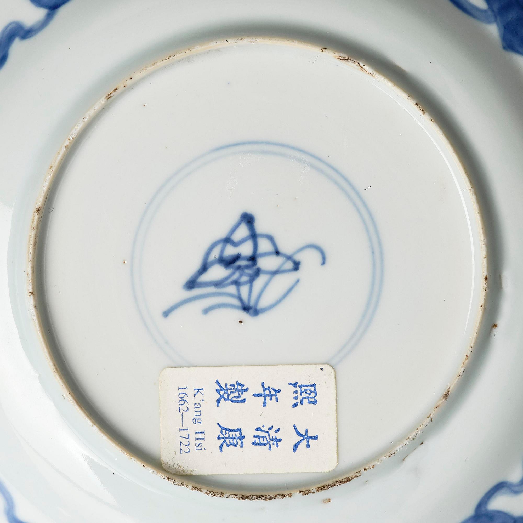 A pair of blue and white 'dragon and fish dishes', Qing dynasty, Kangxi (1662-1722).