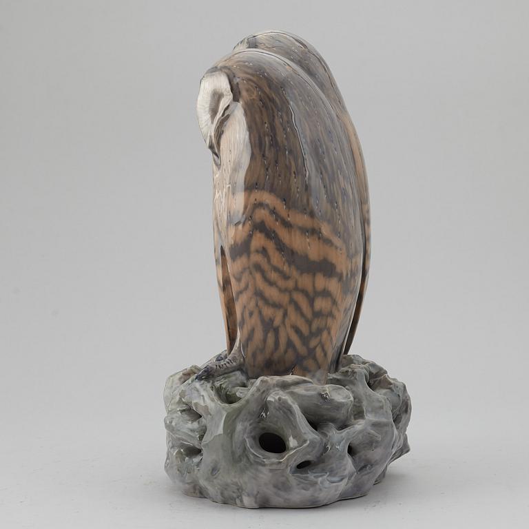 A Royal Copenhagen porcelain figure of two owls, Denmark, 20th Century.