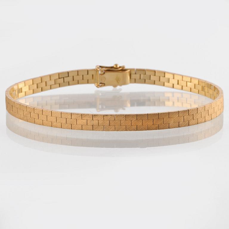 ARMLÄNK, 18K guld, importstämplad. Vikt 16,3 gram.