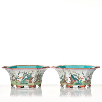 A pair of famille rose flower pots with stands, probably Republic, China, 20th Century.