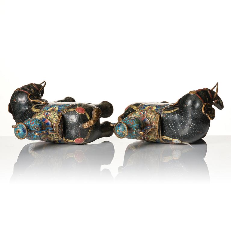 A pair of Chinese cloisonné and chamleve caparisoned elephants, Qing dynasty, 18th/19th Century.