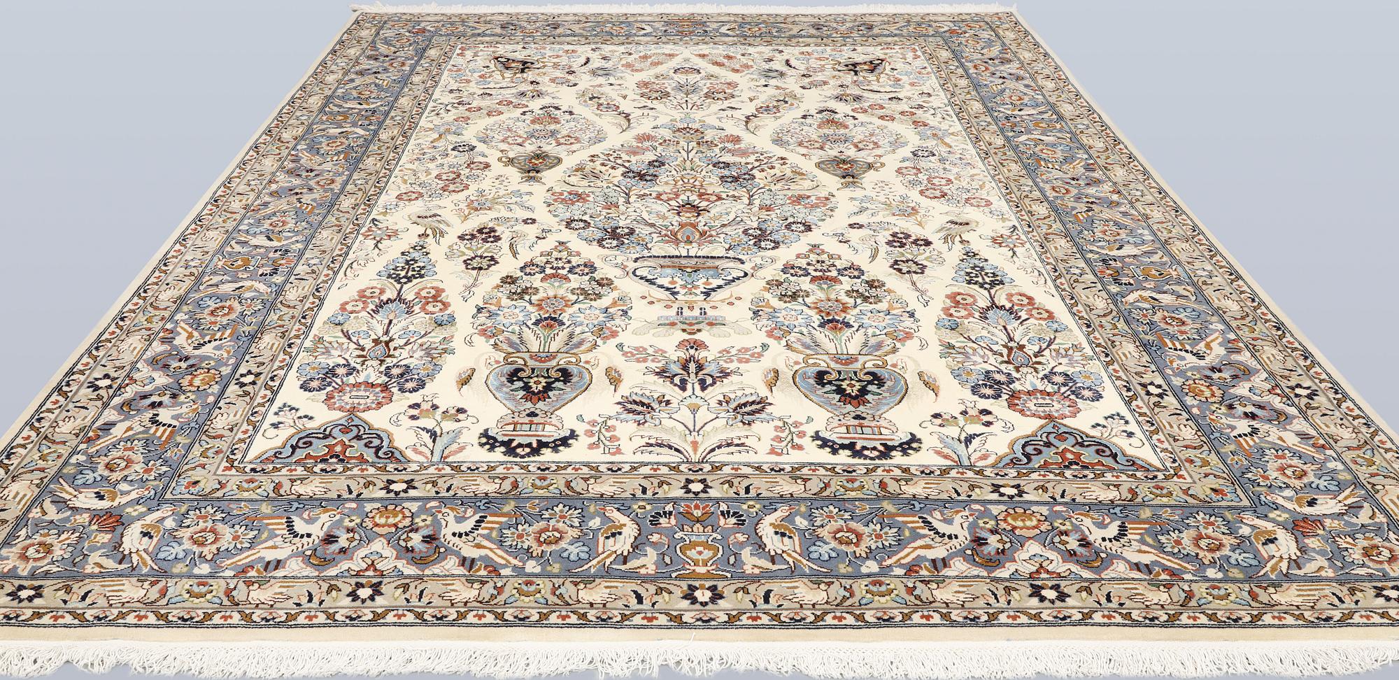 A Shareza carpet, signed, approx. 358 x 254 cm.