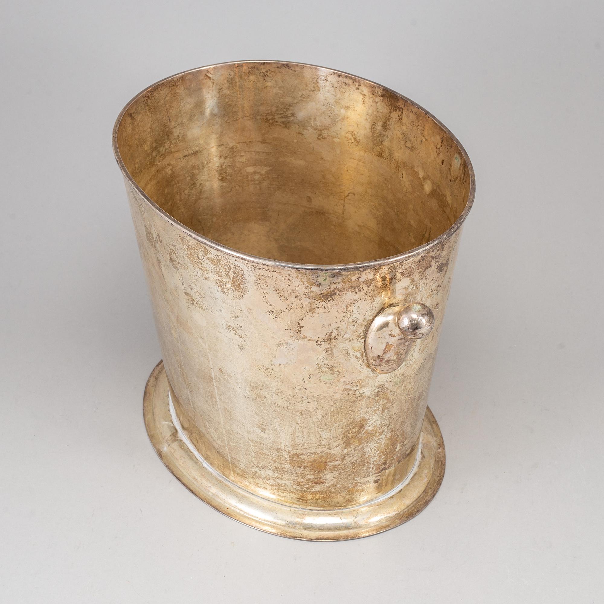 A 20th century plate wine cooler.