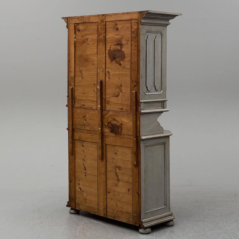 A 19th Century Baroque style cupboard.