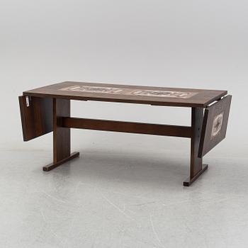 A Danish dining table and eight chairs from Gangsø Møbler A/S, 1960's-70's.