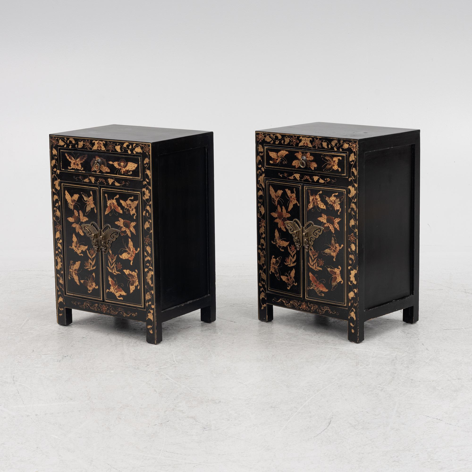 A pair of bedside tables/cabinets, China, 20th century.