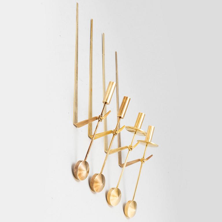 A set of four wall sconces by Pierre Forsell, Skultuna.