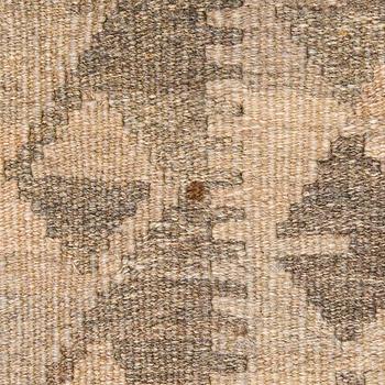 A Kilim carpet, ca. 305 x 196 cm.