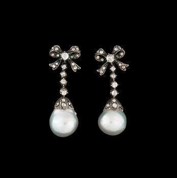 1062. A pair of natural pearl and rose-cut diamond earrings.