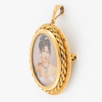 Pendant/brooch in 18K gold with a lady's portrait.