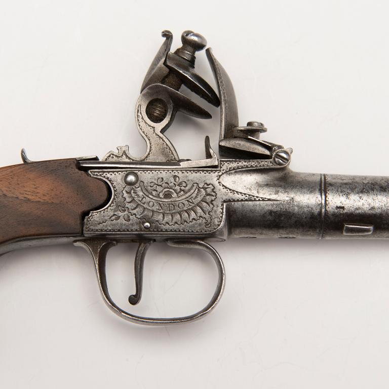 A pair of english boxlock flintock pistols marked E. Bond London, circa 1800.